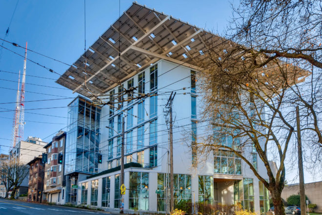 The exterior of the Bullitt Center crowned with solar panels in Seattle, WA