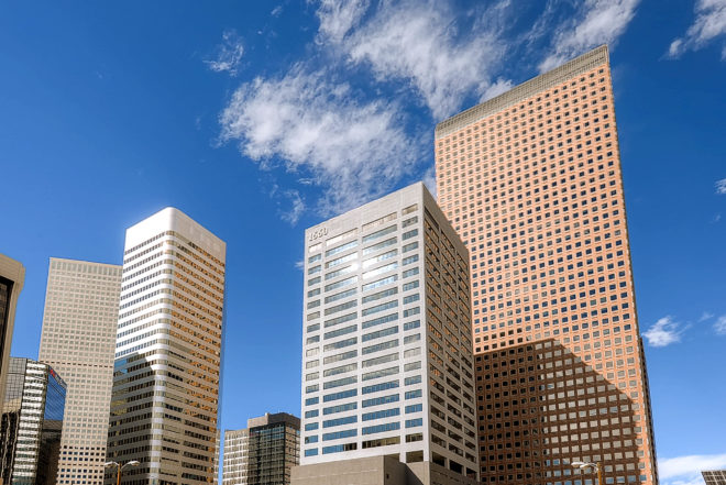 1660 Lincoln, a 31-story office tower in Denver, surrounded by skyscrapers