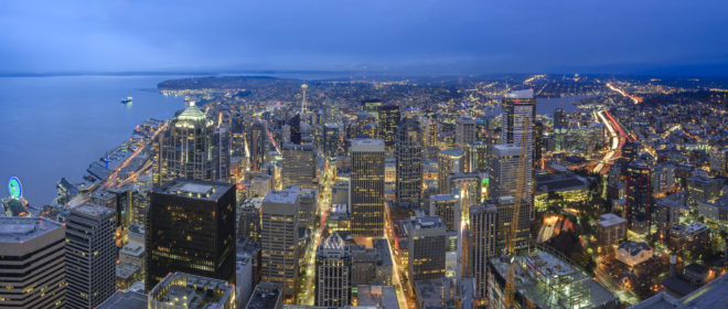 An aerial of Seattle's downtown lights at night