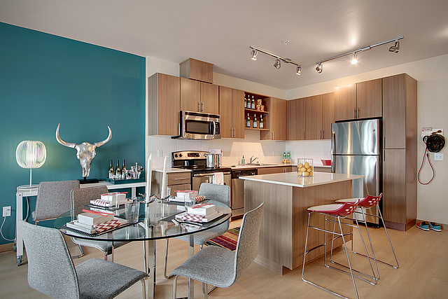 An apartment at Slate, with modern finishes and wood accents.