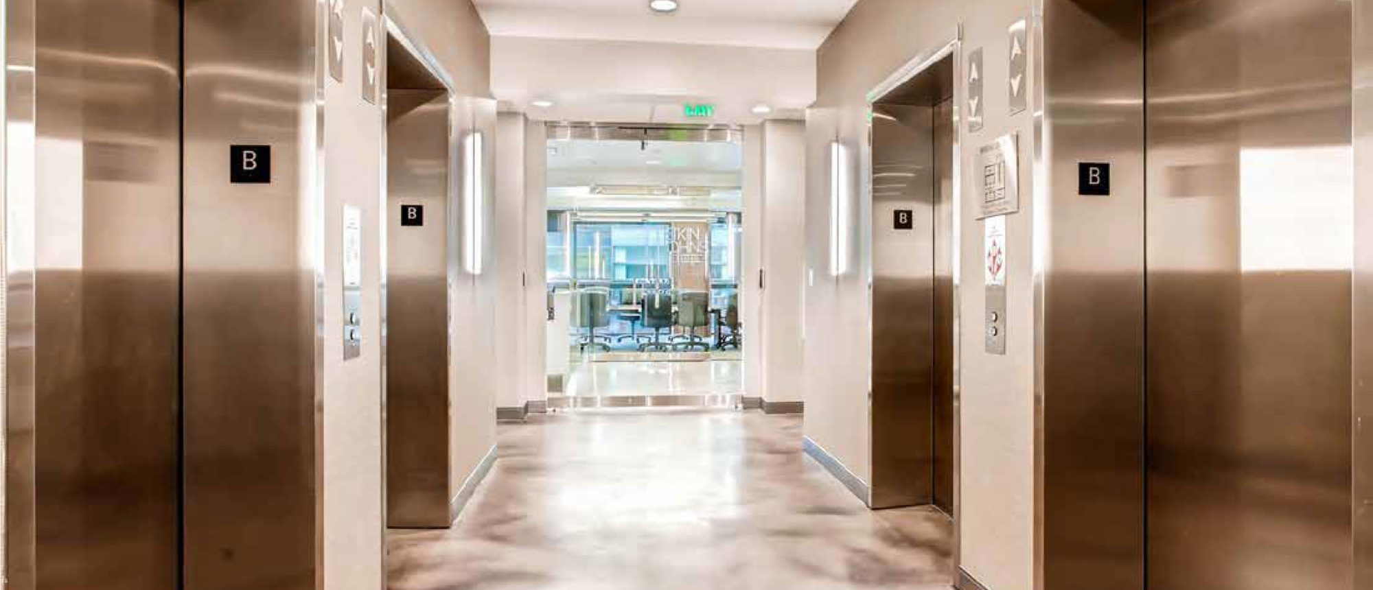 Writer Square elevator lobby with polished concrete floor.