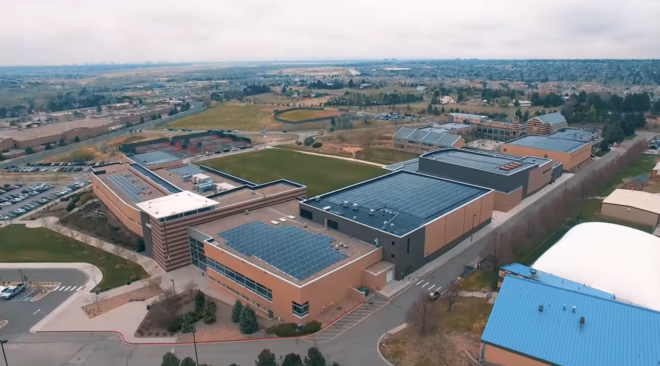 Regis Jesuit High School in Aurora, Colorado with new photovoltaic system on the roof