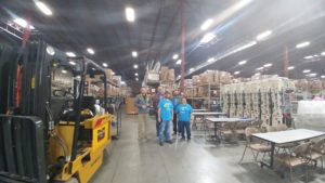 Unico employees in Denver were joined by leadership as they sorted, packed, and ship medical supplies with Project C.U.R.E.