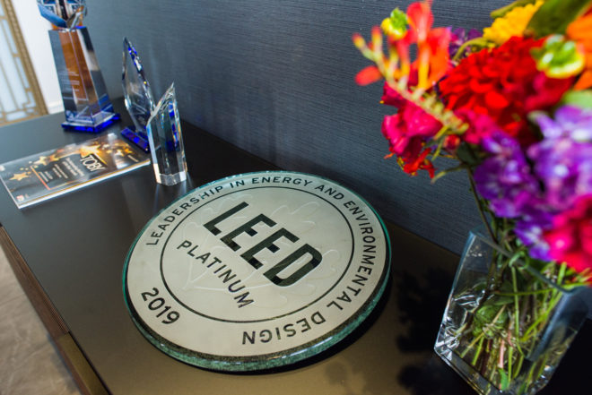 Smith Tower's LEED Platinum plaque displayed at the LEED Plaque Ceremony held at the Smith Tower's The Lookout venue space on its 22nd floor.