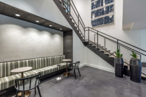 Updated hospitality-focused lobby at the fully-transformed and rebranded One Nashville in downtown Nashville, Tennessee.